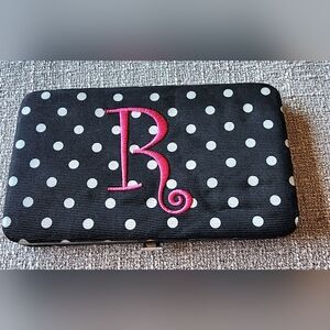 Initial "R" wallet.